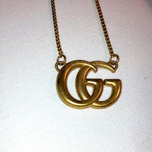 Gucci giant logo charm on necklace